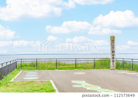 Nemuro City, Hokkaido, the easternmost tip of the mainland, Cape Nosappu in summer, the monument of Cape Nosappu and the surrounding hazy scenery Nemuro City, Hokkaido, the easternmost tip of the mainland, Cape Nosappu in summer, the monument of Cape Nosappu and the surrounding hazy scenery 112573649