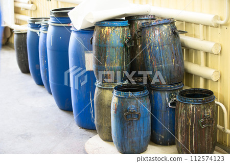 Plastic barrels with paint Plastic barrels with paint 112574123
