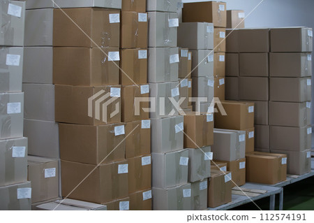 Warehouse with cardboard boxes Warehouse with cardboard boxes 112574191
