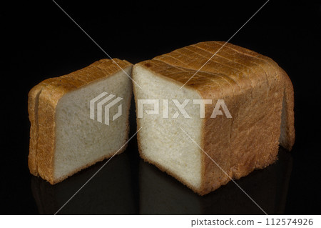 White bread for toast on a black background White bread for toast on a black background 112574926