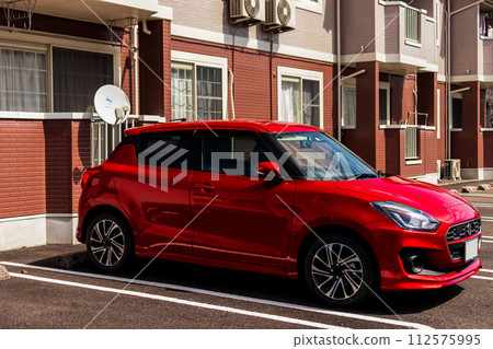Building and red car Building and red car 112575995