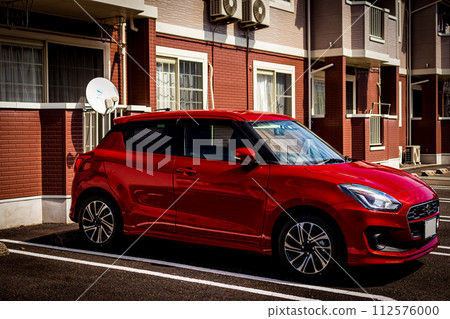Building and red car Building and red car 112576000