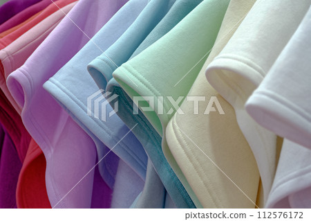 Multi-colored tricot clothing in pastel colors 112576172
