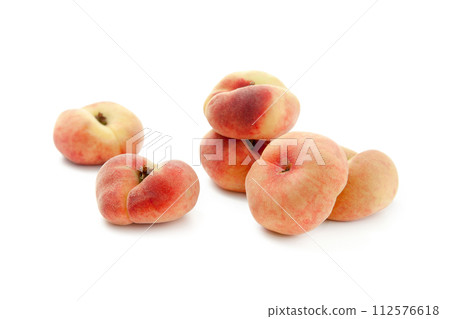 Several saturn peaches or flat peaches isolated on white background with clipping path.. 112576618