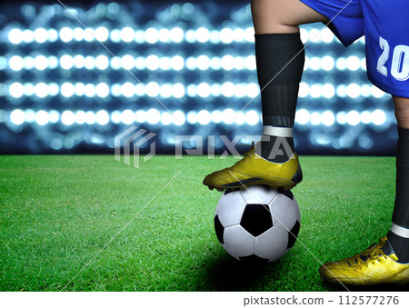 man on soccer field and the bright lights man on soccer field and the bright lights 112577276
