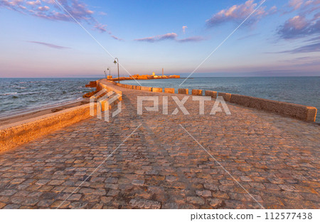 Fort Saint Sebastian and the bridge to it at dawn. 112577438