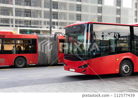 Modern bus on the city street. 112577439