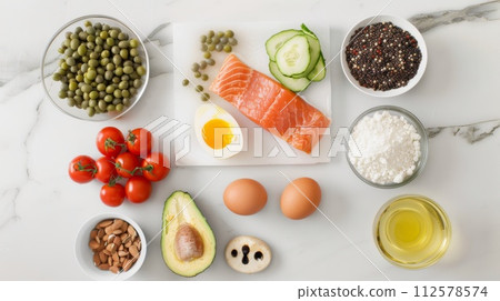 Healthy food concept. Salmon, eggs, vegetables, beans, lentils, cheese, olive 112578574