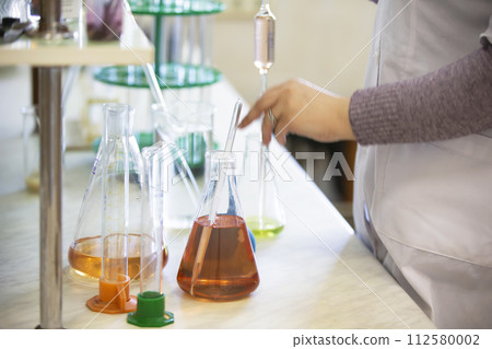 Laboratory with glass test tubes for alcoholic beverages. Laboratory with glass test tubes for alcoholic beverages. 112580002