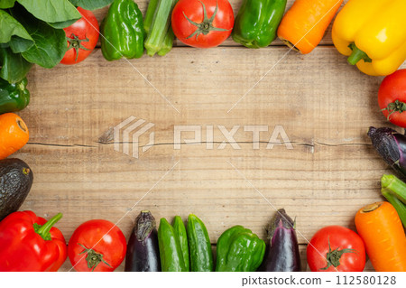 Lots of vegetables and natural wood free space Lots of vegetables and natural wood free space 112580128