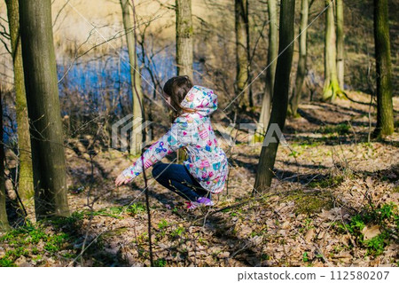 girl in a spring forest girl in a spring forest 112580207