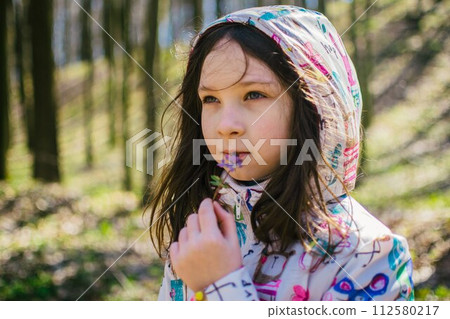 girl in a spring forest 112580217