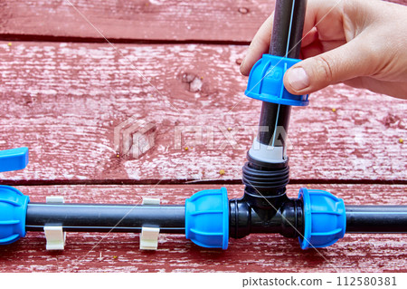 Tee way compression clamp fitting for Installation of irrigation pipeline from HDPE pipes. 112580381