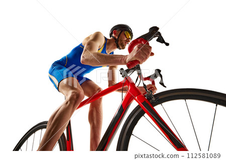 Bottom view dynamic image of man, athlete, cyclist in motion riding on bike isolated on white studio background 112581089
