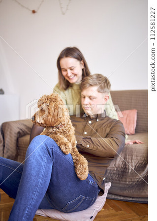 cockapoo in the hands of parents cockapoo in the hands of parents 112581227