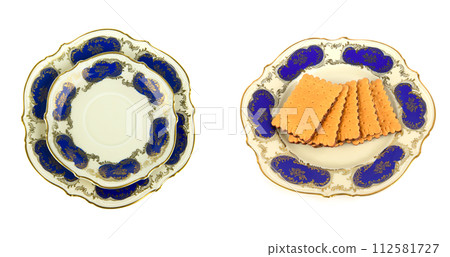 Vintage saucers and plates isolated on white. There is free space for text. Collage. Wide photo. Vintage saucers and plates isolated on white. There is free space for text. Collage. Wide photo. 112581727