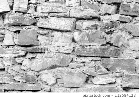 White stone wall with grain texture. White stone wall with grain texture. 112584128