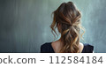 A woman in the rear 112584184