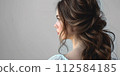 A woman in the rear 112584185