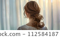 A woman in the rear 112584187