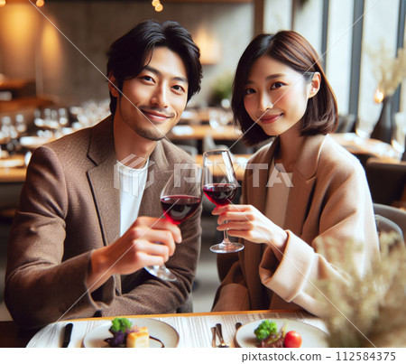 young couple toasting with wine 112584375