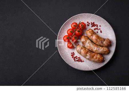 Grilled sausages with spices and herbs. With copy space Grilled sausages with spices and herbs. With copy space 112585166