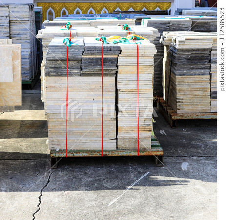 Pile or stack of marble slabs, marble tile used as materials for flooring, Preparation for construction at construction site. 112585523