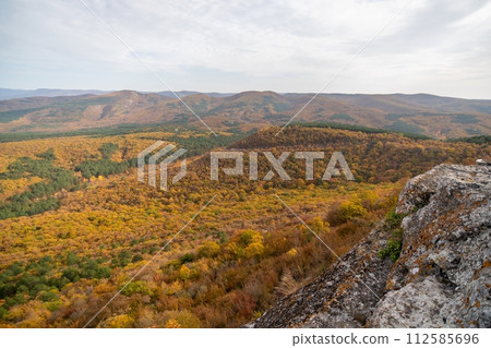 The autumn landscape of the mountain valley is an amazing, beautiful place at any time of the year. Hiking. Nature 112585696