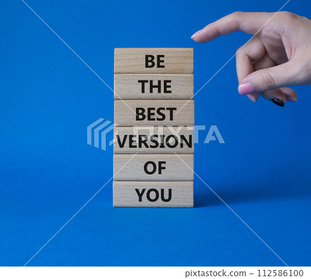 Be the best version of you symbol. Concept words Be the best version of you on wooden blocks. Businessman hand. Beautiful blue background. Business concept. Copy space. Be the best version of you symbol. Concept words Be the best version of you on wooden blocks. Businessman hand. Beautiful blue background. Business concept. Copy space. 112586100