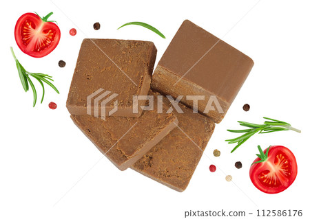 Brown cheese. Norwegian brunost isolated on white background. Top view. Flat lay 112586176
