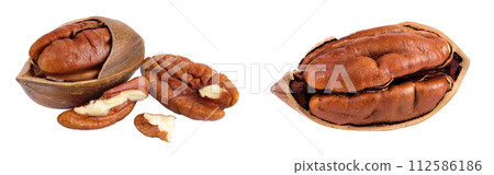 broken pecan nut isolated on white background with full depth of field broken pecan nut isolated on white background with full depth of field 112586186