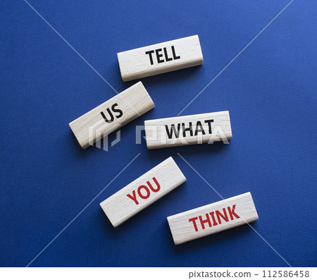 Tell us what you think symbol. Wooden blocks with words Tell us what you think. Beautiful deep blue background. Business and Tell us what you think concept. Copy space. Tell us what you think symbol. Wooden blocks with words Tell us what you think. Beautiful deep blue background. Business and Tell us what you think concept. Copy space. 112586458
