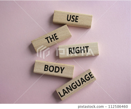 Use the right Body Language symbol. Concept words Use the right Body Language on wooden blocks. Beautiful pink background. Business concept. Copy space Use the right Body Language symbol. Concept words Use the right Body Language on wooden blocks. Beautiful pink background. Business concept. Copy space 112586460