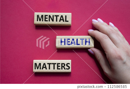 Mental Health Matters symbol. Concept words Mental Health Matters on wooden blocks. Beautiful red background. Doctor hand. Healthcare and Mental Health Matters concept. Copy space. Mental Health Matters symbol. Concept words Mental Health Matters on wooden blocks. Beautiful red background. Doctor hand. Healthcare and Mental Health Matters concept. Copy space. 112586585