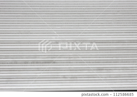 Gray color wooden fence siding of Horizontal boards background. Wall or fence textured. Gray color wooden fence siding of Horizontal boards background. Wall or fence textured. 112586685
