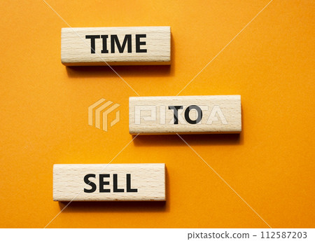 Time to Sell symbol. Concept words Time to Sell on wooden blocks. Beautiful orange background. Business and Time to Sell concept. Copy space. Time to Sell symbol. Concept words Time to Sell on wooden blocks. Beautiful orange background. Business and Time to Sell concept. Copy space. 112587203