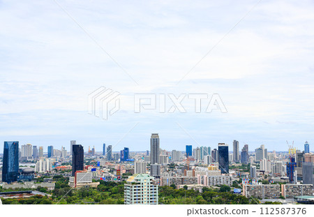 Cityscape skyline on CBD, skyscrapers and office building in the cloudy evening light of BANGKOK. 112587376