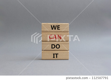 We can do it symbol. Concept words We can do it on wooden blocks. Beautiful grey background. Business and We can do it concept. Copy space. We can do it symbol. Concept words We can do it on wooden blocks. Beautiful grey background. Business and We can do it concept. Copy space. 112587791