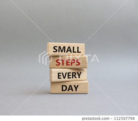 Small Steps Every Day symbol. Wooden blocks with words Small Steps Every Day. Beautiful grey background. Business and Small Steps Every Day concept. Copy space. Small Steps Every Day symbol. Wooden blocks with words Small Steps Every Day. Beautiful grey background. Business and Small Steps Every Day concept. Copy space. 112587798