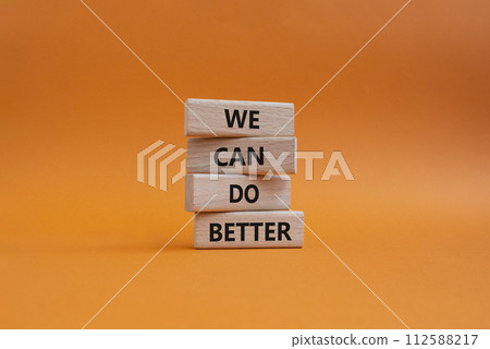 We Can Do Better symbol. Concept words We Can Do Better on wooden blocks. Beautiful orange background. Business and We Can Do Better concept. Copy space. We Can Do Better symbol. Concept words We Can Do Better on wooden blocks. Beautiful orange background. Business and We Can Do Better concept. Copy space. 112588217