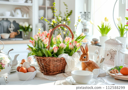 AI-generated content. A white table adorned with a basket overflowing with vibrant flowers, creating a cheerful Easter kitchen decoration. 112588299