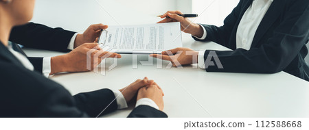 Business executive signing contract agreement document. Shrewd 112588668