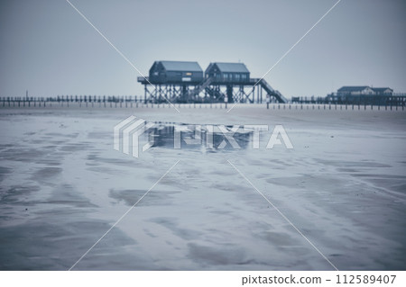 stilt house at sankt peter-ording germany 112589407