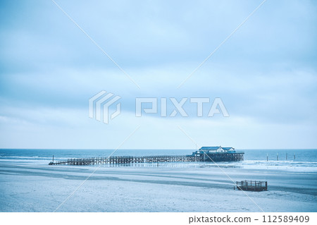 Building on stilts at north sea in germany 112589409