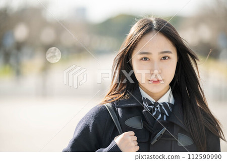 A female high school student looking intently at the future A female high school student looking intently at the future 112590990