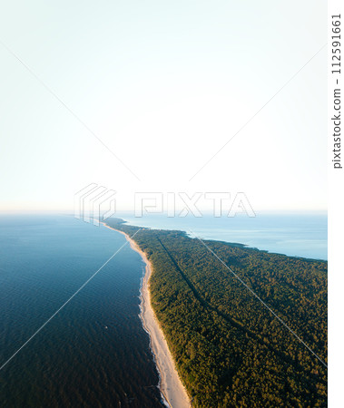 Curonian Spit wth Baltic sea coastline on sunset. Kurshskaya kosa national park near Zelenogradsk. Kaliningrad region 112591661