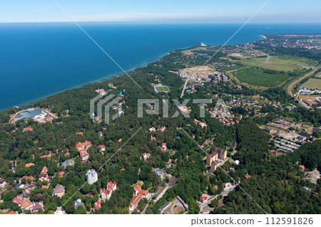 Baltic sea coastline with Svetlogorsk town. Aerial view Baltic sea coastline with Svetlogorsk town. Aerial view 112591826