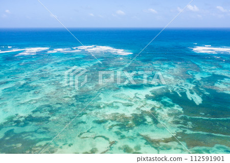 Atlantic ocean with reef and azure water. Caribbean nature. Aerial view Atlantic ocean with reef and azure water. Caribbean nature. Aerial view 112591901