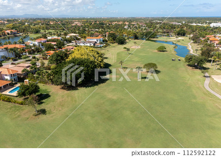Golf club building and field, nobody. Aerial view Golf club building and field, nobody. Aerial view 112592122