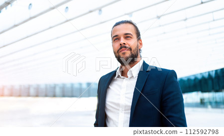 Handsome confidence hispanic businessman 112592798